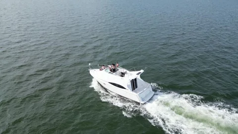Aerial drone view low over a boat in Tampa Bay FL USA Stock Footage 245934264