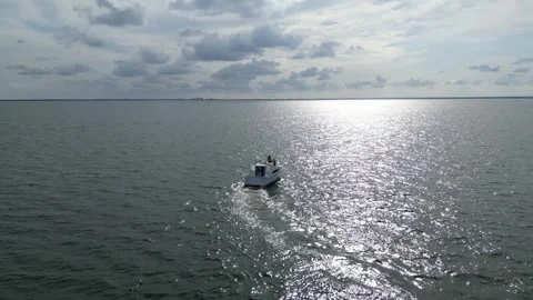 Aerial drone view low over a boat in Tampa Bay FL USA Stock Footage 245934265