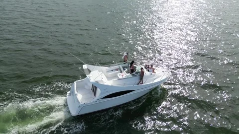 Aerial drone view low over a boat in Tampa Bay FL USA Stock Footage 245934379