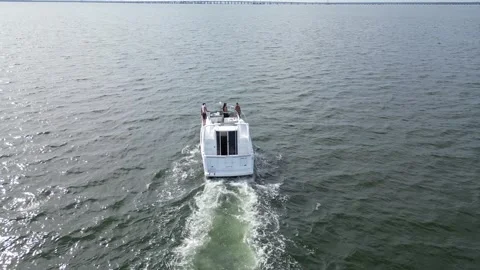 Aerial drone view low over a boat in Tampa Bay FL USA Stock Footage 245934381