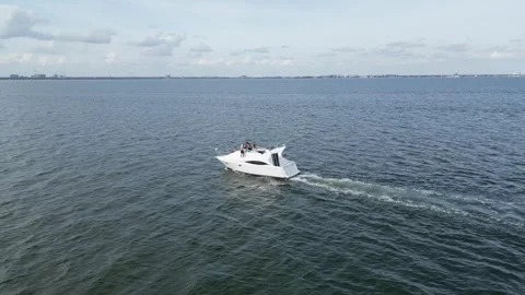 Aerial drone view low over a boat in Tampa Bay FL USA Stock Footage 245934383