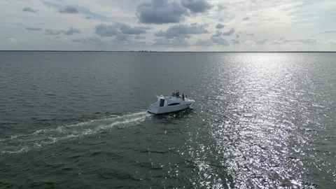 Aerial drone view low over a boat in Tampa Bay FL USA Stock Footage 245934388