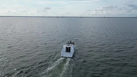 Aerial drone view low over a boat in Tampa Bay FL USA Stock Footage 245934408