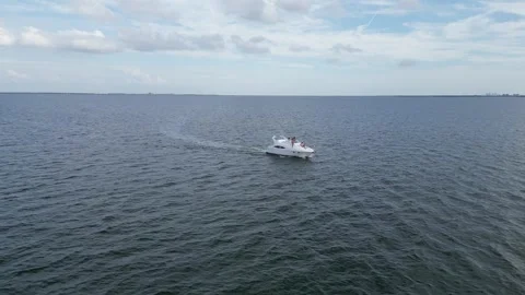 Aerial drone view low over a boat in Tampa Bay FL USA Stock Footage 245934412