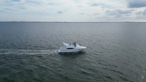 Aerial drone view low over a boat in Tampa Bay FL USA Stock Footage 245934420