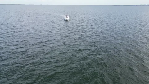 Aerial drone view low over a boat in Tampa Bay FL USA Stock Footage 245934424