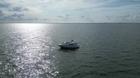 Aerial drone view low over a boat in Tampa Bay FL USA Stock Footage 245934447