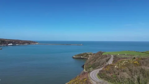 Aerial Drone View of Lower Town Fishguard Harbour, Pembrokeshire Coast, Wales UK Stock-Footage 332072809