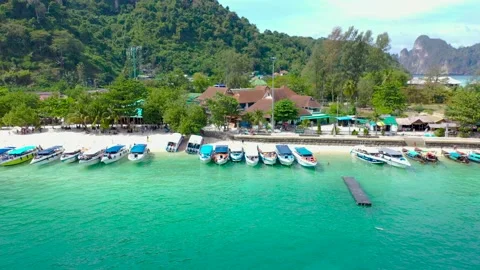 Aerial drone view of main Pier Ton Sai on Phi Phi Island during sunny summer day Видео 147453938