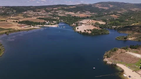 Aerial drone view of man made beaches at Albufeira do Azibo near Braganca, PT Stock Footage 313088804
