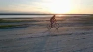 Aerial Drone View Of A Man Riding The Bike Near The Kuyalnik Stock Footage