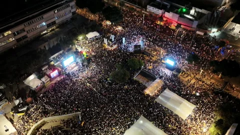 Aerial Drone View of Mass Protest for Hostage Release in Tel Aviv Stock Footage 319459512