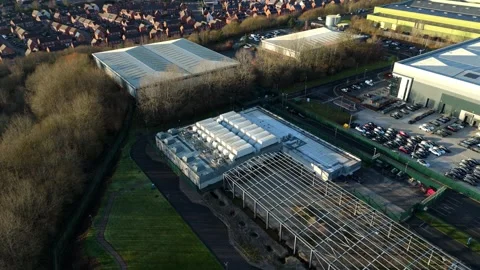 Aerial drone view of a massive modern data center for AI and cloud computing Stock Footage 333542482