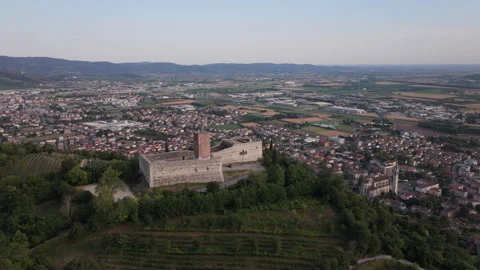 Aerial drone view of medieval castle with town background in Italy Stock Footage 342539960