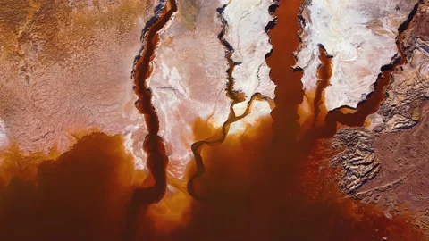 Aerial drone view of Mining activity. Polluted lake, red color of water. Stock Footage 220951905
