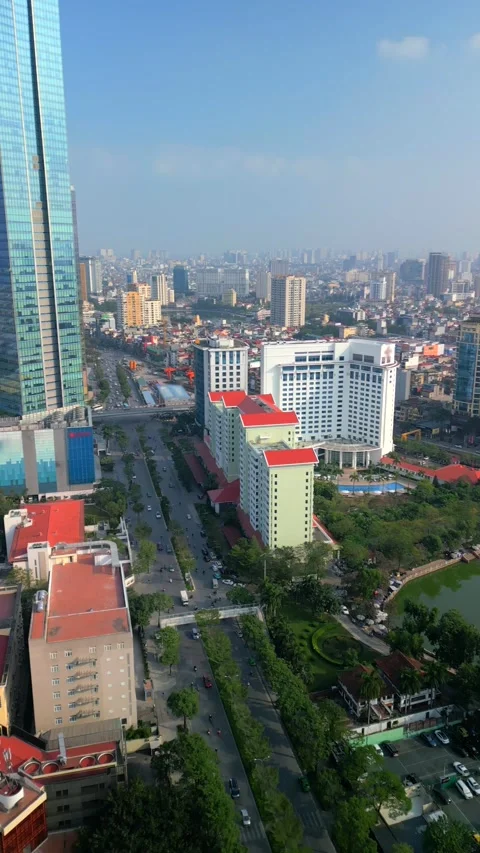 Aerial drone view of modern Hanoi with morning traffic in Vietnam Video stock 336672437