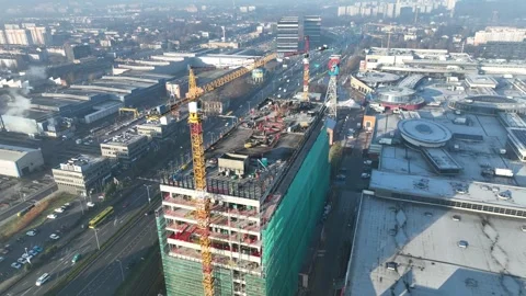 Aerial drone view of a modern high rise building under construction. Constr.. Stock Footage 310259098