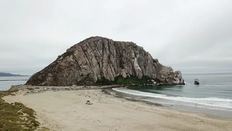 Aerial Drone View of Morro Bay Rock, a prominent landmark Video stock 93429068