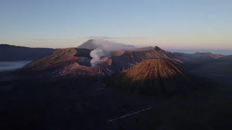 Aerial drone view of Mount Bromo volcano, East Java, Indonesia, at sunrise Stock Footage 319998954