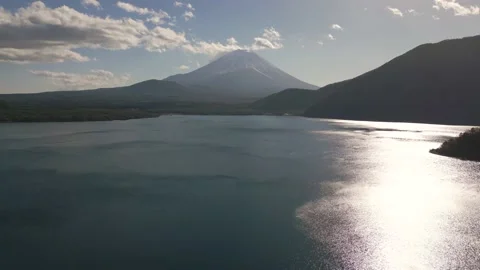 Aerial drone view of Mount Fuji in Winter from lake Motosu, Yamanashi Stock Footage 230769953