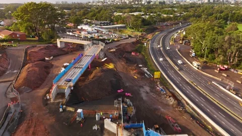 Aerial drone view of the Mount Ousley Interchange Upgrade at Mount Ousley, NSW Stock Footage 335569988