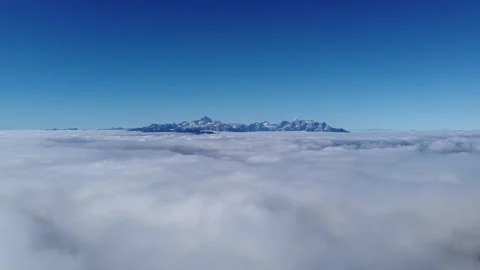 Aerial Drone View from Mount Stol Above Clouds on a Sunny Autumn Day, Slovenia Stock Footage 329319056