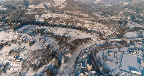 Aerial drone view in mountain forest. Winter landscape in 4к Stock Footage 128694723