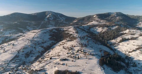 Aerial drone view in mountain forest. Winter landscape in 4к Stock Footage 128694779