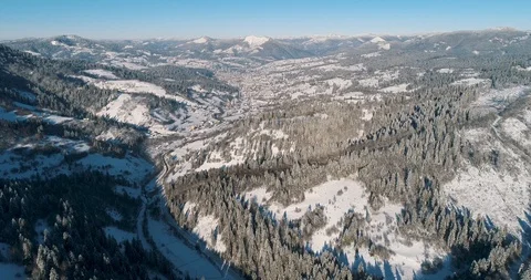 Aerial drone view in mountain forest. Winter landscape in 4к Stock Footage 128694841