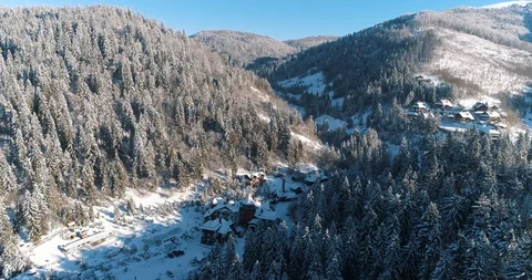 Aerial drone view in mountain forest. Winter landscape in 4к Stock Footage 128695012