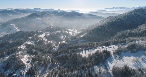 Aerial drone view in mountain forest. Winter landscape in 4к Stock Footage 128695152