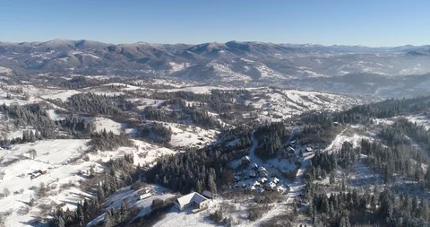 Aerial drone view in mountain forest. Winter landscape in 4к Stock Footage 128695197