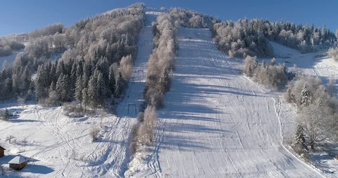 Aerial drone view in mountain forest. Winter landscape in 4к Stock Footage 128695207