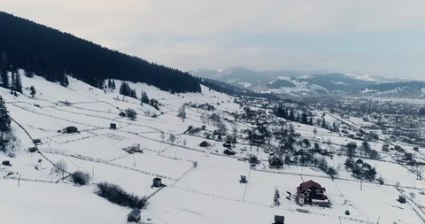 Aerial drone view in mountain forest. Winter landscape in 4к Stock Footage 128699393