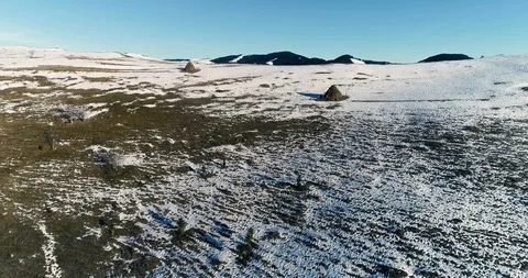 Aerial drone view in mountain forest. Winter landscape in 4к Stock Footage 128699523