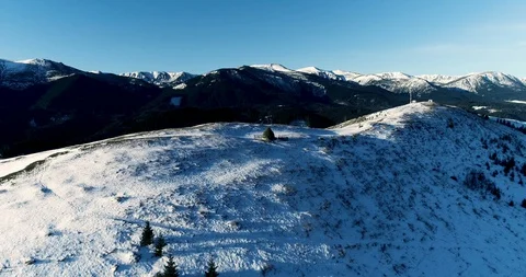 Aerial drone view in mountain forest. Winter landscape in 4к Stock Footage 128699598