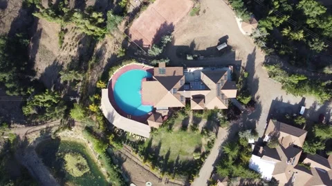 Aerial drone view of mountain resort with pool in Chile Stock Footage 334815449