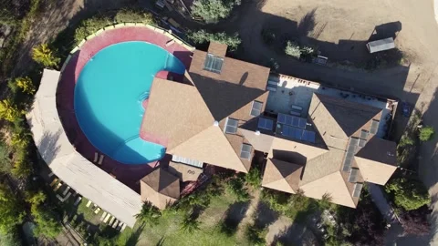 Aerial drone view of mountain resort with pool in Chile Stock Footage 334815451