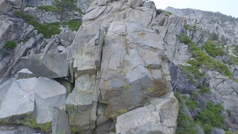 Aerial drone view of mountain rocks and cliff, Tahoe Lake, California Stock-Footage 100848926