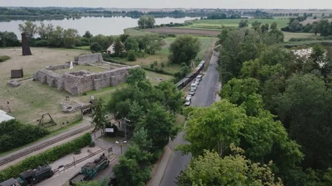 Aerial Drone View of Moving Train and Castle Ruins in Wenecja Video stock 325812974