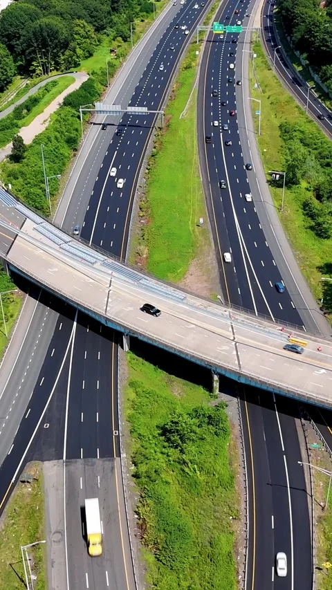 Aerial drone view of a multi-lane highway interchange with moving... Stock Footage 344332544