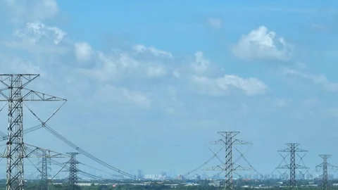 Aerial drone view of multiple high-voltage transmission towers. Stock Footage 339403896