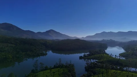 Aerial Drone View of Munnar Tea Plantations with Misty Mountains Stock Footage 328331569