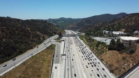 Aerial Drone View of Navigating the 405  Freeway in LA Stock Footage 93428659