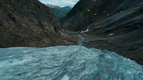 Aerial Drone View of Nigardsbreen Glacier Norway Showing Glacier Retreat Stockbeeldmateriaal 339136065