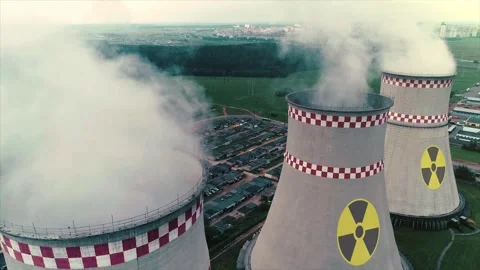 Aerial drone view of nuclear power plant cooling towers Stock Footage 329021382