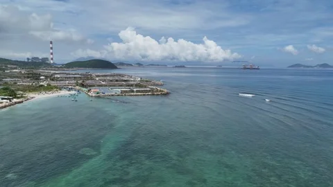 Aerial Drone View of Ocean Islands and Distant Industrial Harbor 스톡 동영상 337012680
