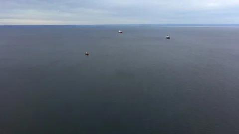 Aerial drone view of ocean sailing boats near Punta Arenas, Chilean Patagonia Stock Footage 105878161