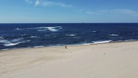 Aerial Drone View - Ocean, Waves and Golden Sand at the Beach on a Sunny Day Stock Footage 152595227