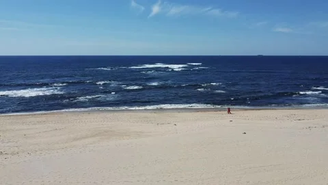 Aerial Drone View - Ocean, Waves and Golden Sand at the Beach on a Sunny Day Stock Footage 152595229